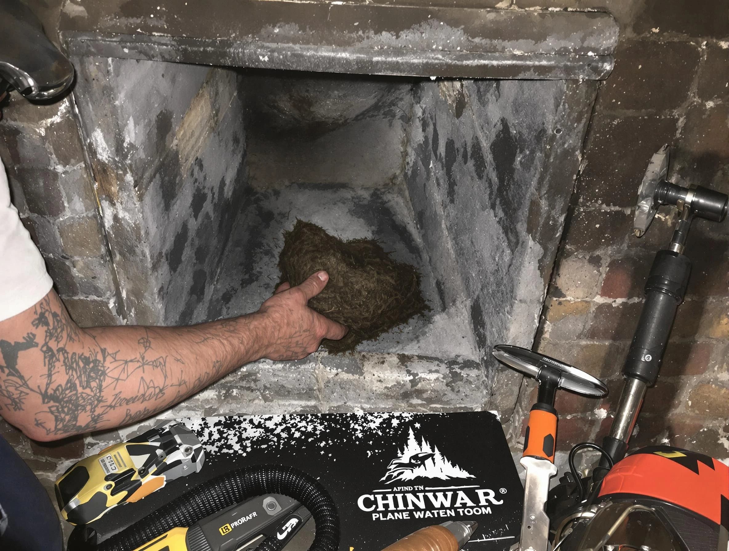 Tooele Chimney Sweep safely removing debris and screening chimney in Tooele, UT