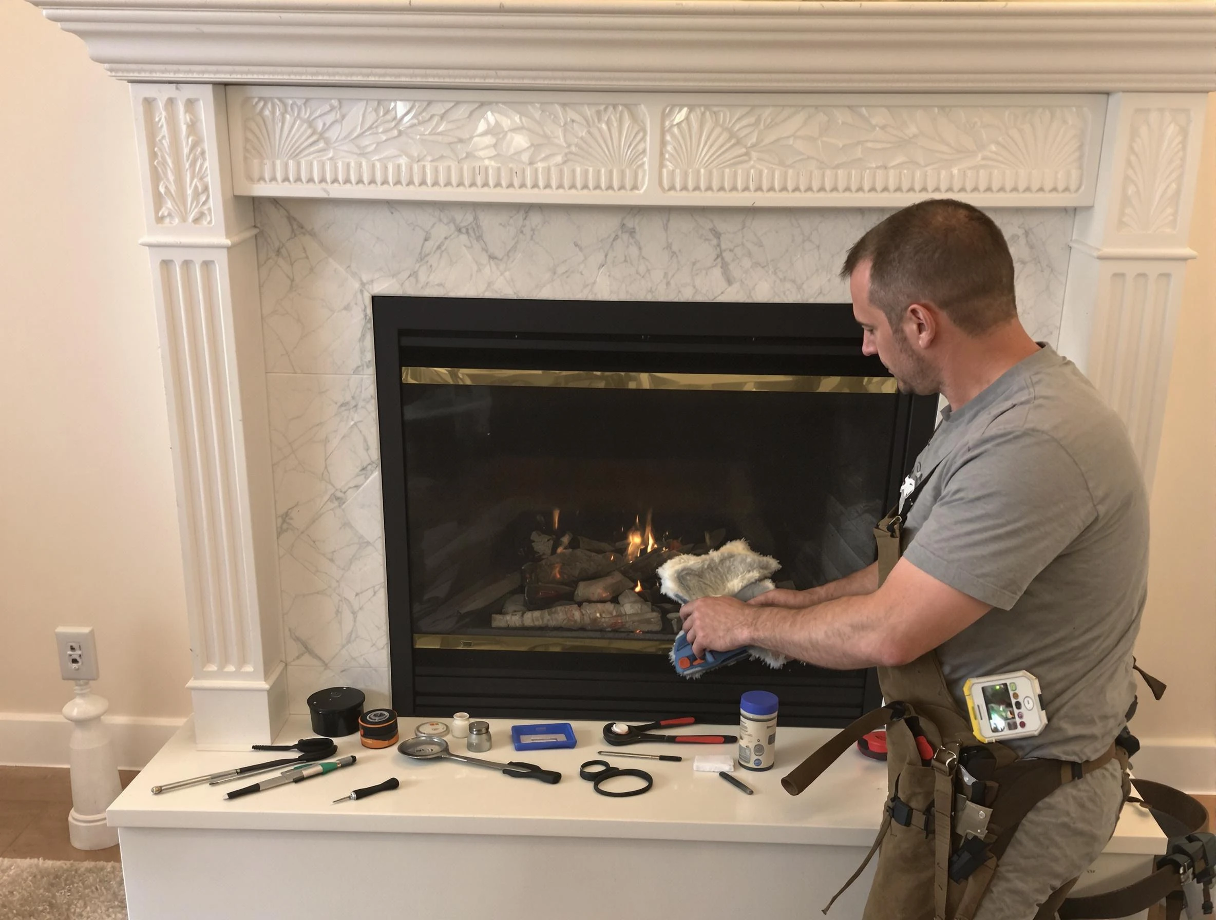 Tooele Chimney Sweep performing fireplace maintenance in Tooele, UT